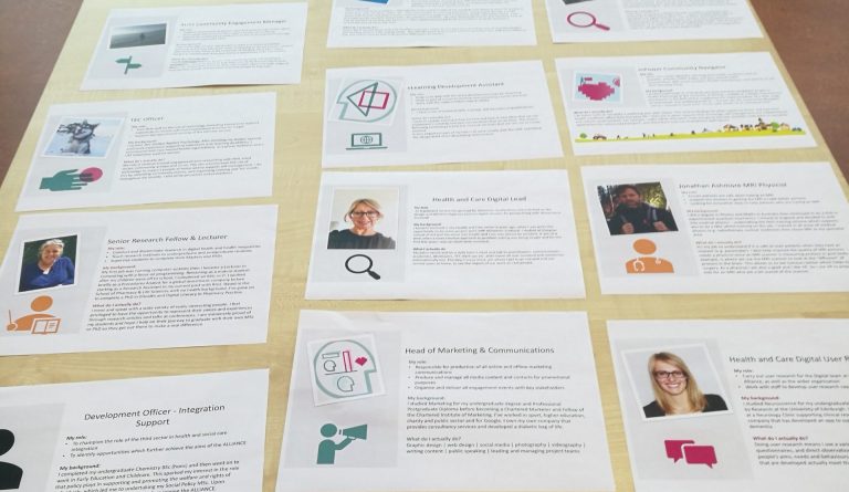 Image of various job profiles laid out on a table